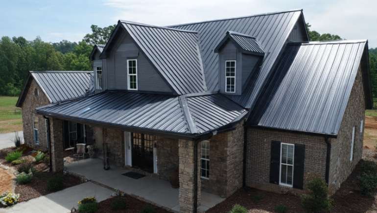 How Weather Conditions Influence Choosing Standing Seam or Corrugated Metal Roofs
